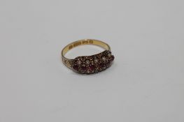An antique 15ct gold ring, size N/O.