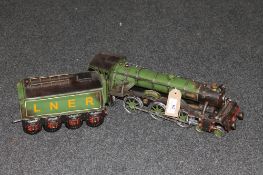 A contemporary tin plate Flying Scotsman with wagon