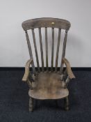 A late 19th century farmhouse kitchen armchair