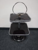 A chrome Art Deco two-tier serving stand on circular base