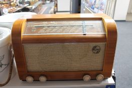 A mid 20th century walnut cased Philips valve radio