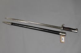 A World War II German bayonet in sheathe