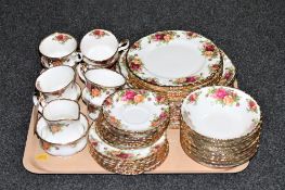 Approximately fifty-two pieces of Royal Albert Old Country Roses tea and dinner ware