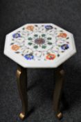 An Octagonal inlaid marble plant stand on a gilt wood base