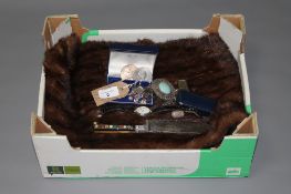 A box containing a fur wrap together with a small quantity of sterling silver jewellery including