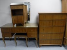 A four piece mid 20th century bedroom suite comprising of five drawer chest,