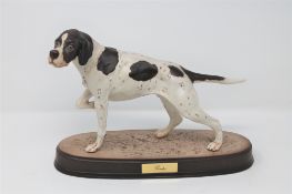 A Beswick figure of a pointer on stand