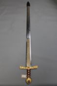 A gilt handled ornamental sword