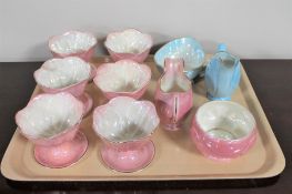A tray of six Maling pink lustre grapefruit dishes,