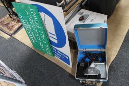 A cased British gas Microphax machine together with two fire assembly notices and one safety notice