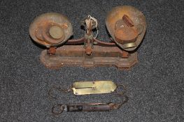 A set of vintage Avery scales with weights together with two sets of brass spring balance scales