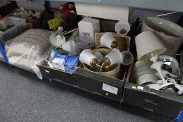 Three boxes of light fittings, angle poise lamp, spot lights, wall lights,