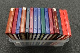 Fifteen albums of Royal Mail Stamp Card Series postcards.