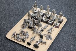 A tray of metal figures including regimental soldiers, wheel right,