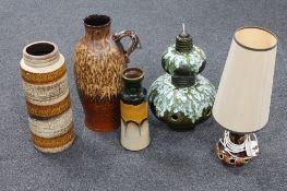 A West German pottery jug together with two West German table lamps and two West German vases