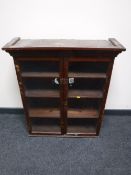 A pine glazed door bookcase top