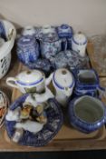 Two trays of Ringtons caddies, Ringtons chintz teapots, wall plates,