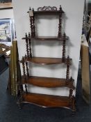 A Victorian mahogany five tier whatnot stand