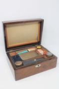 An antique walnut fitted writing box