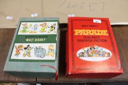 Two mid twentieth century Walt Disney box sets including the wonderful world of Walt Disney and