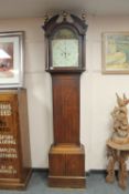 A nineteenth century oak longcase clock with painted dial by J A Thompson of Darlington,