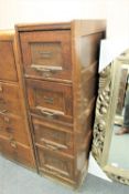 An early twentieth century four door filing cabinet, height 135 cm.