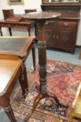 A Victorian mahogany torchere,