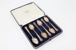 A set of six cased silver teaspoons,