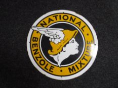 A circular enamelled National Benzole Mixture advertising sign