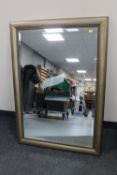 A contemporary framed bevelled mirror