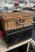 An antique metal deed box together with a wicker picnic basket with contents
