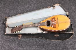 A mother of pearl inlaid mandolin by Stridente