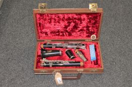 A five piece Boosey and Hawke clarinet in fitted case