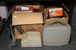 Two boxes containing photography developing items, tripod, projector etc.