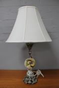 A Moorcroft table lamp on silver plated base