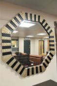 A contemporary octagonal two tone framed mirror, width 121 cm.