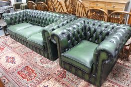 A green buttoned leather Chesterfield three seater settee with matching armchair