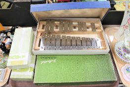 Tray containing a boxed Goldon chromatic elite dialaphone together with four boxed recorders