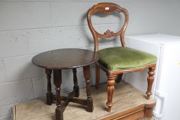 A Victorian mahogany dining chair together with a circular oak occasional table