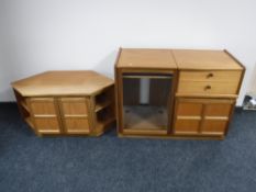 A Parker Knoll teak corner TV stand with matching entertainment unit