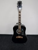 A Lorenzo model N191-A acoustic guitar on stand