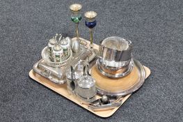 A tray of assorted plated wares, two long boat cruet stands, entree dish with cover,