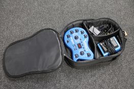 A cased Behringer V.