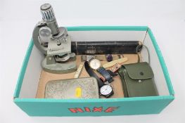 A box of silver plated cigarette case, miniature opticraft microscope,