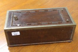 An oak framed brass bound bell box