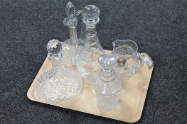 A tray of four lead crystal cut glass decanters,