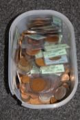 A tub of pre decimal British coins