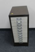A metal ten drawer index chest