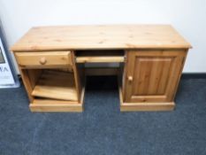 A contemporary pine computer desk