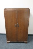 An oak double door gentleman's wardrobe